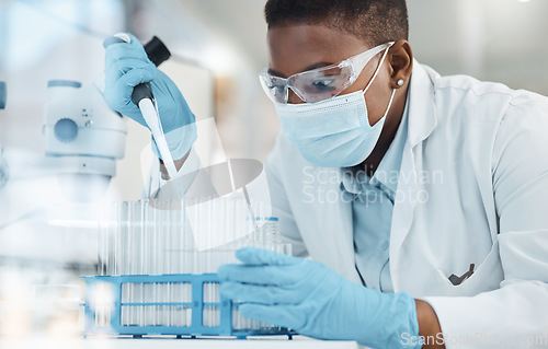 Image of What a curious discovery. a young scientist working with samples in a lab.