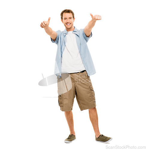 Image of Always be grateful for the good times. a young man giving the thumbs up against a studio background.