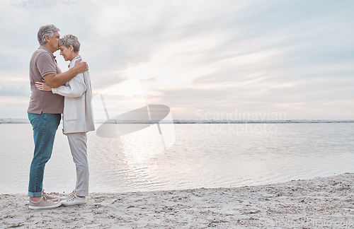 Image of Nothing means more to me than having you by mu side. a mature couple spending the day at the beach.