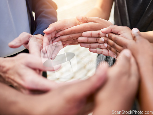 Image of Follow the rhythm of your heart. a group of unrecognizable people making a circle shape with their hands outside.