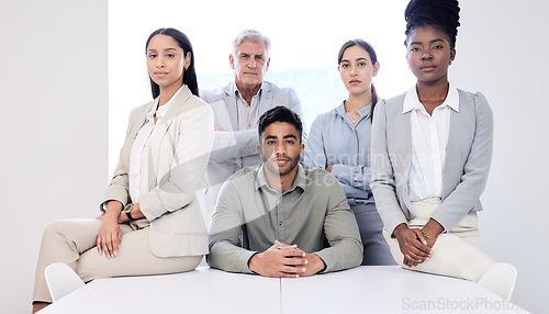 Image of This is not a game for us. Portrait of a group of confident businesspeople in an office.
