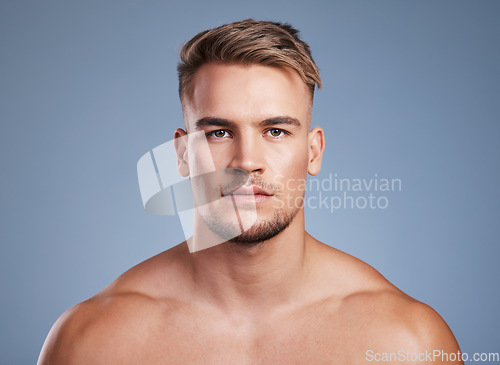 Image of Make sure you look good, not for others but yourself. Studio shot of a handsome young man posing against a grey background.