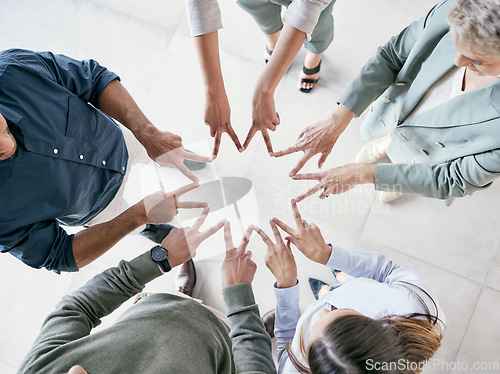 Image of The future depends on what you do today. a group of businesspeople joining hands in solidarity.