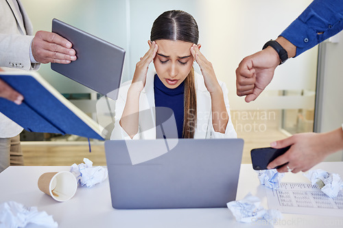 Image of Take care of your mind before anything else. a young businesswoman looking overwhelmed in a demanding work environment.