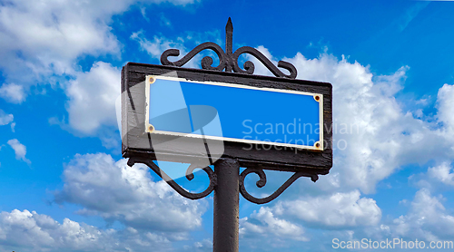 Image of old metal signpost