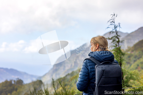 Image of Tourist woman enjoing landscape of Madeira