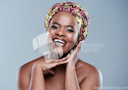 Image of I bring good vibes only. Studio portrait of a beautiful young woman posing against a grey background.