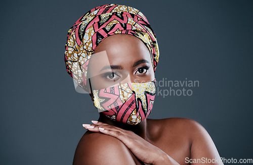 Image of Being good to your skin is so rewarding. Studio portrait of a beautiful young woman wearing a mask against a grey background.