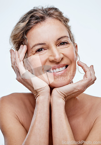 Image of We can take steps to help our skin stay supple and fresh-looking. a beautiful mature woman posing against a white background.
