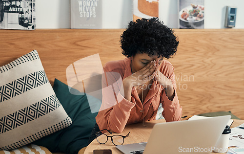 Image of No one said it would be easy, but itll be worth it. a woman looking stressed while working from a cafe.