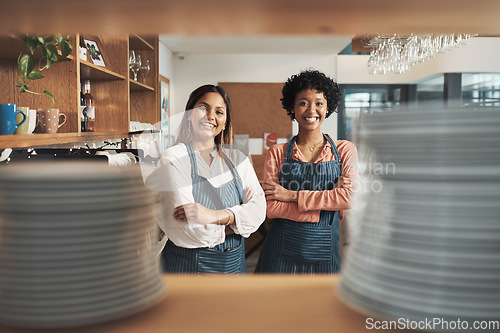 Image of Were great friends and even better business partners. two young women working in a cafe.