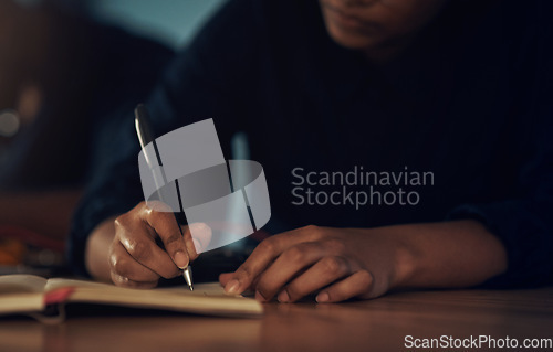 Image of Whatever the tech problem, she’ll make a plan. an unrecognisable technician writing in a notebook while repairing computer hardware.