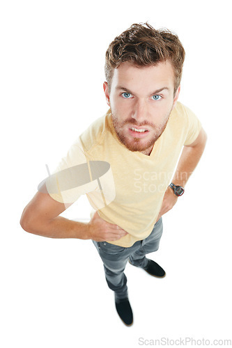 Image of Dont mess with my stress. Studio portrait of an angry young man standing with his hands on his hips against a white background.