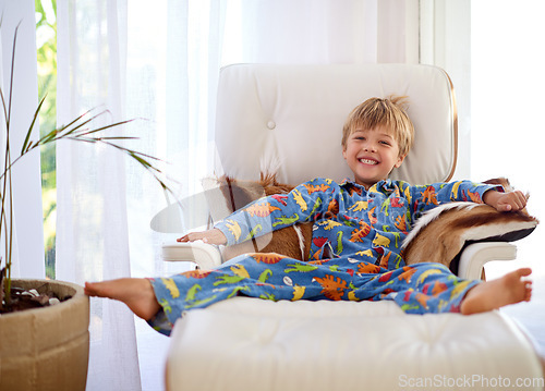 Image of Ultimate relaxation. Portrait of an adorable little boy relaxing on the couch at home.