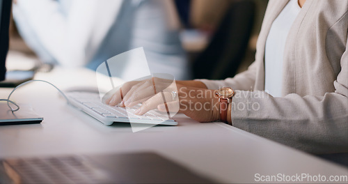 Image of Business woman, hands and typing on keyboard at night for project deadline, communication or networking at office. Closeup of female person, typist or journalist working late on computer at workplace