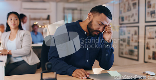 Image of Black man, headache and stress in office, deadline and laptop for work, mental health and upset. Employee, overworked and exhausted for business, career and upset for mistake, burnout and migraine