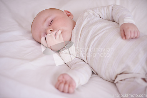 Image of Learning and growing everyday. a cute and adorable baby boy at home.