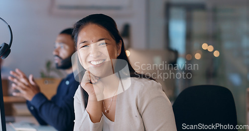 Image of Happy asian woman, portrait and call center at night for customer service, support or telemarketing at office. Female person, consultant or agent working late with smile for help or online advice