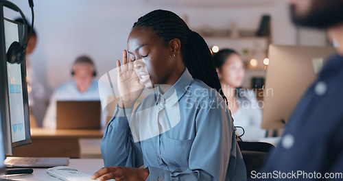 Image of Business woman, headache and call center stress, pain or frustrated on computer with sales fail, crisis or bad news. African agent, night consultant with depression or tired for telemarketing mistake