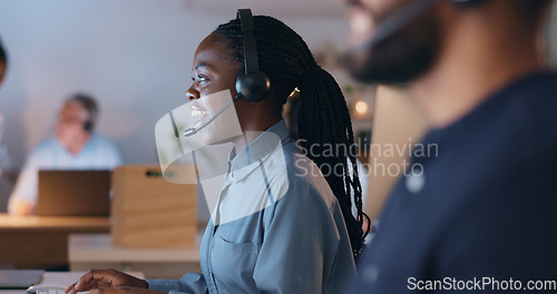 Image of Happy woman, call center and night communication, customer service or e commerce support on computer. Professional consultant or african agent of web solution, questions or business chat in workspace