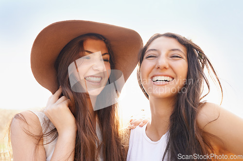 Image of We not worried about tomorrow we only live for today. Two beautiful young friends spending time together in the sunshine.