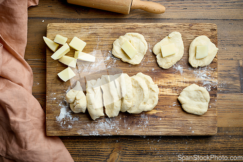 Image of yeast dough buns filled with cheese