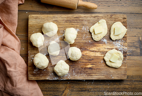 Image of yeast dough buns filled with cheese