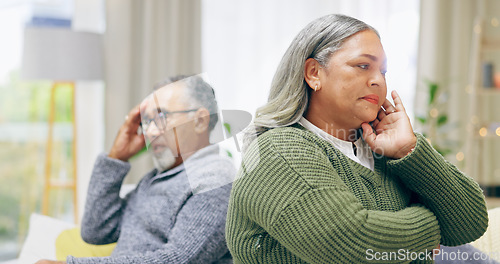 Image of Senior couple, ignoring and upset on fight, argument and divorce for marriage problems. People, stress and frustrated for silent treatment, living room and anxious in retirement, couch and conflict