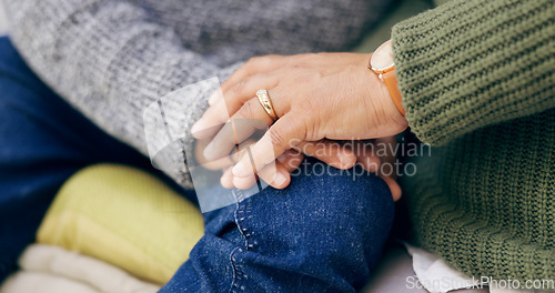 Image of Holding hands, couple and bonding in close up for marriage, support and trust in relationship. Security, hope and care in unity, empathy and man or woman gratitude, zoom and love in commitment