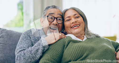 Image of Watching tv, home and senior couple on a couch, love and relax with a smile, retirement and marriage. Romance, old man and elderly woman on a sofa, movies and films with relationship and laughing