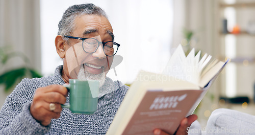 Image of Senior man, book and coffee on sofa with smile, reading or relax in retirement in home living room. Elderly person, literature and happy with tea cup for knowledge, thinking and drink on lounge couch