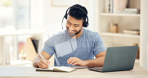 Image of Every idea can become something great. a young male call center agent working in an office.