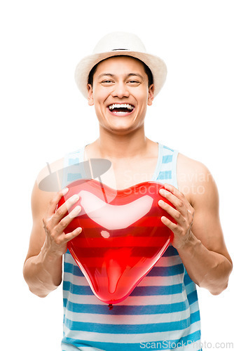 Image of The heart can swell to twice its size. a young man holding a heart balloon against a studio background.