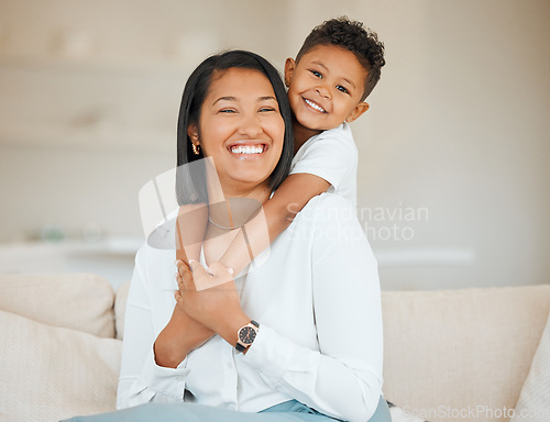 Image of Think of your family today and every day thereafter. a young mother sitting in the living room at home and bonding with her son.