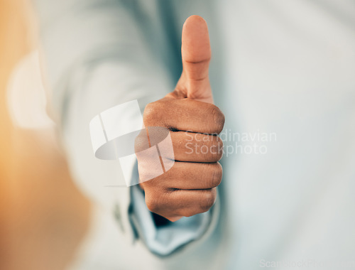 Image of I approve this. an unrecognizable businessperson showing a thumbs up at work.