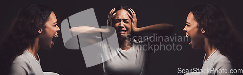 Image of You never know how strong you are. a young woman experiencing mental anguish and screaming against a black background.