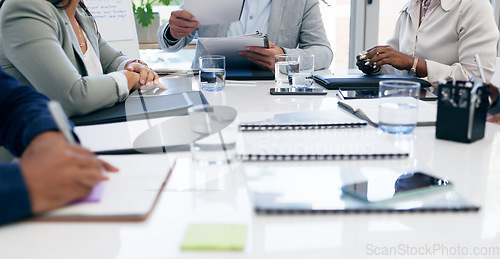 Image of Hands, documents and hands of business people in office meeting for financial, review or budget analysis. Corporate, collaboration and accounting team coworking on paper, data or research statistics