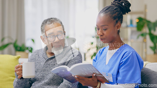 Image of Coffee, reading book or senior man with nurse on sofa for nursing home, retirement or house. Healthcare, help or elderly patient with caregiver, black woman or volunteer in hospice for rehabilitation