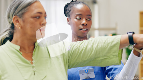 Image of Nurse, old woman and rehabilitation with physical therapy, exercise and health with wellness, treatment and fitness. Office, stretching and physiotherapist with pensioner, elderly lady and healing