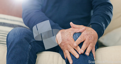 Image of Home, injury and senior man with knee pain, closeup and inflammation with bruise in a living room. Pensioner, old person and elderly guy on a sofa, accident or emergency with muscle tension or broken