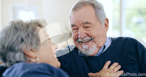 Image of Home, conversation and senior couple on a couch, funny and happiness with retirement in a living room. Romance, old man and elderly woman with love, support and funny with discussion and laughing