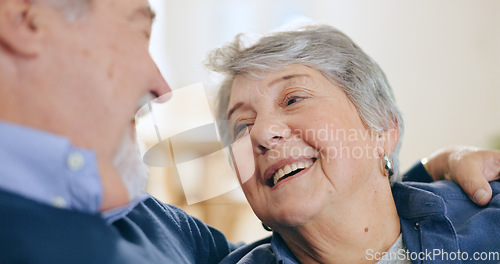 Image of Hug, laughing or old couple in home talking to relax, enjoy conversation or funny joke together in retirement. Happy, senior woman or elderly man bonding with love, support or smile in living room