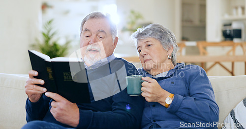 Image of Coffee, bible and a senior couple in their home to read a book together during retirement for religion. Faith, belief or spiritual with an elderly man and woman learning about god in the living room