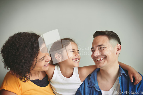 Image of Shes quite the joker. a happy young family spending quality time together.