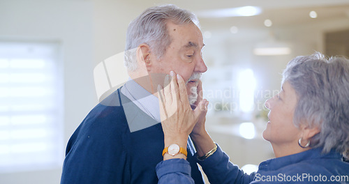 Image of Old couple, love or touch on face in home to relax for romance, support, bond with trust, care or comfort. Elderly people together in marriage, house or retirement with commitment, affection or peace