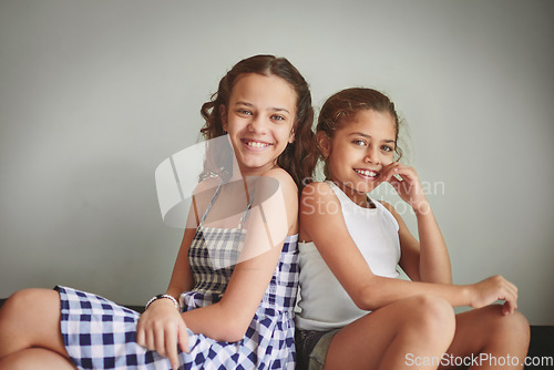Image of We have each others backs. two young girls spending time together at home.