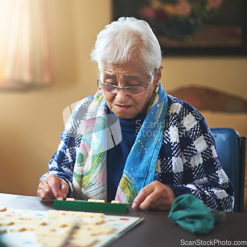 Image of Have I got a word for you. seniors playing a boardgame.