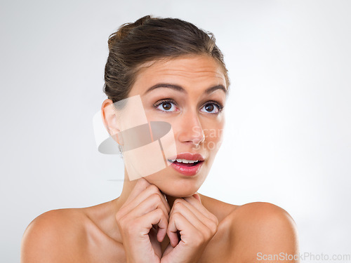 Image of She cant wait for some new beauty products. Cropped studio shot of a beautiful young woman looking expectant.