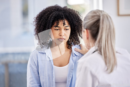 Image of Everything is going to be alright. a female doctor comforting her patient in a office.