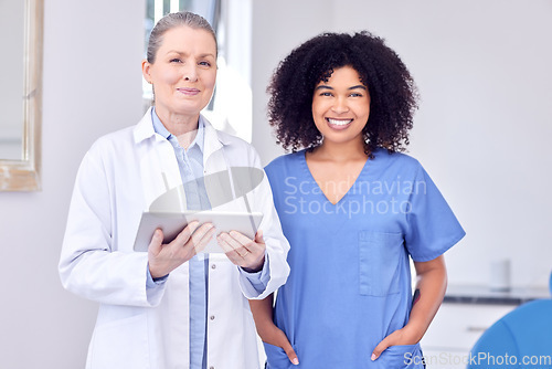 Image of Crafting beautiful smiles are what were best at. two female dentists in their office.